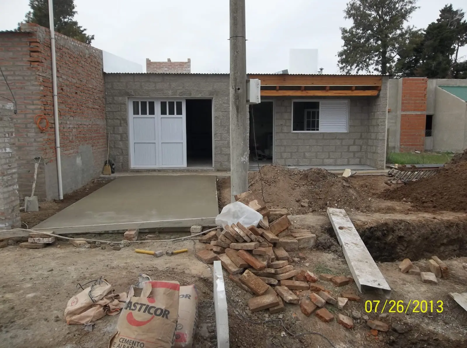 Vivienda compacta y ampliación — registro real de obra 32